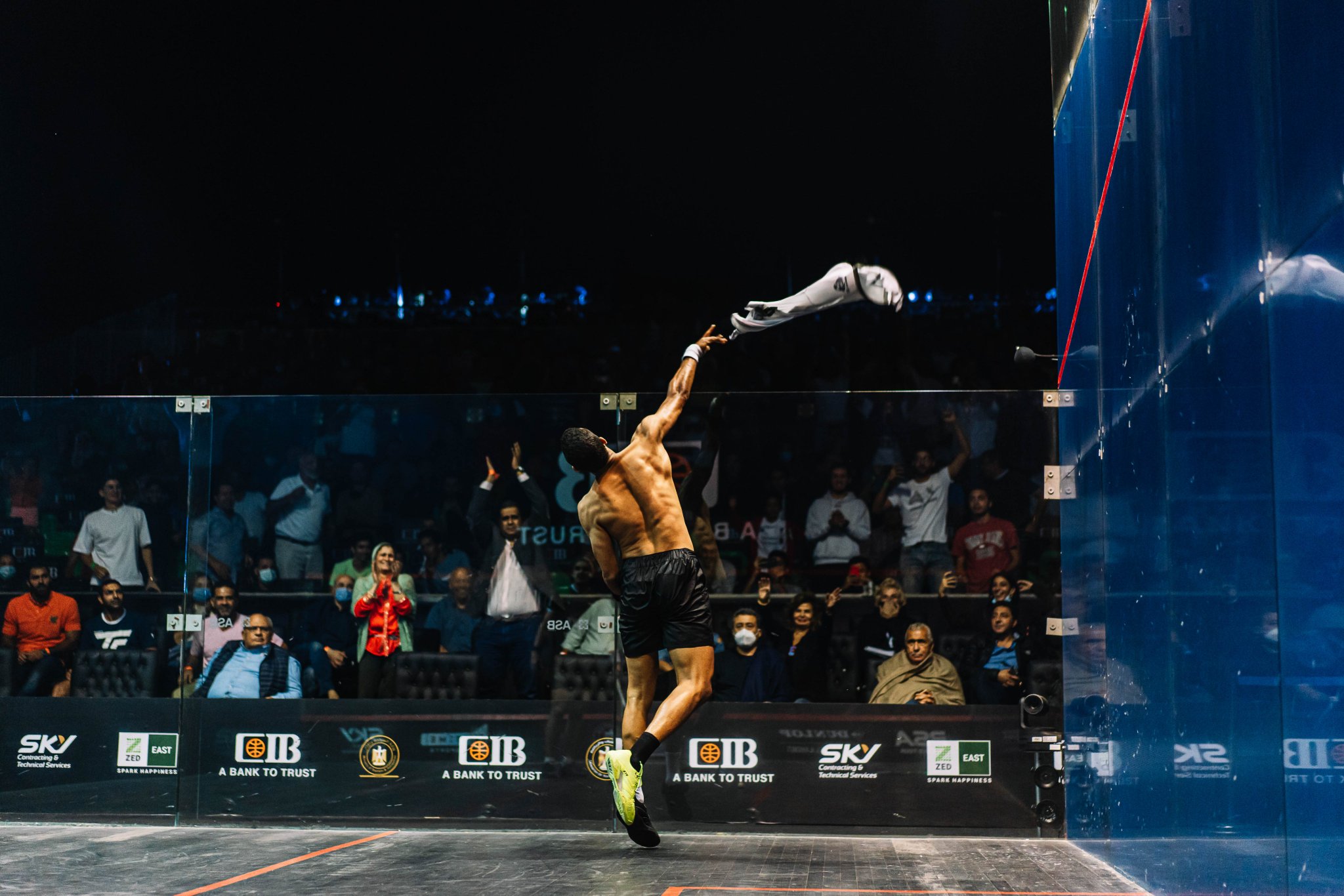 Mostafa Asal throws his shirt into the crowd at the CIB Egyptian Open