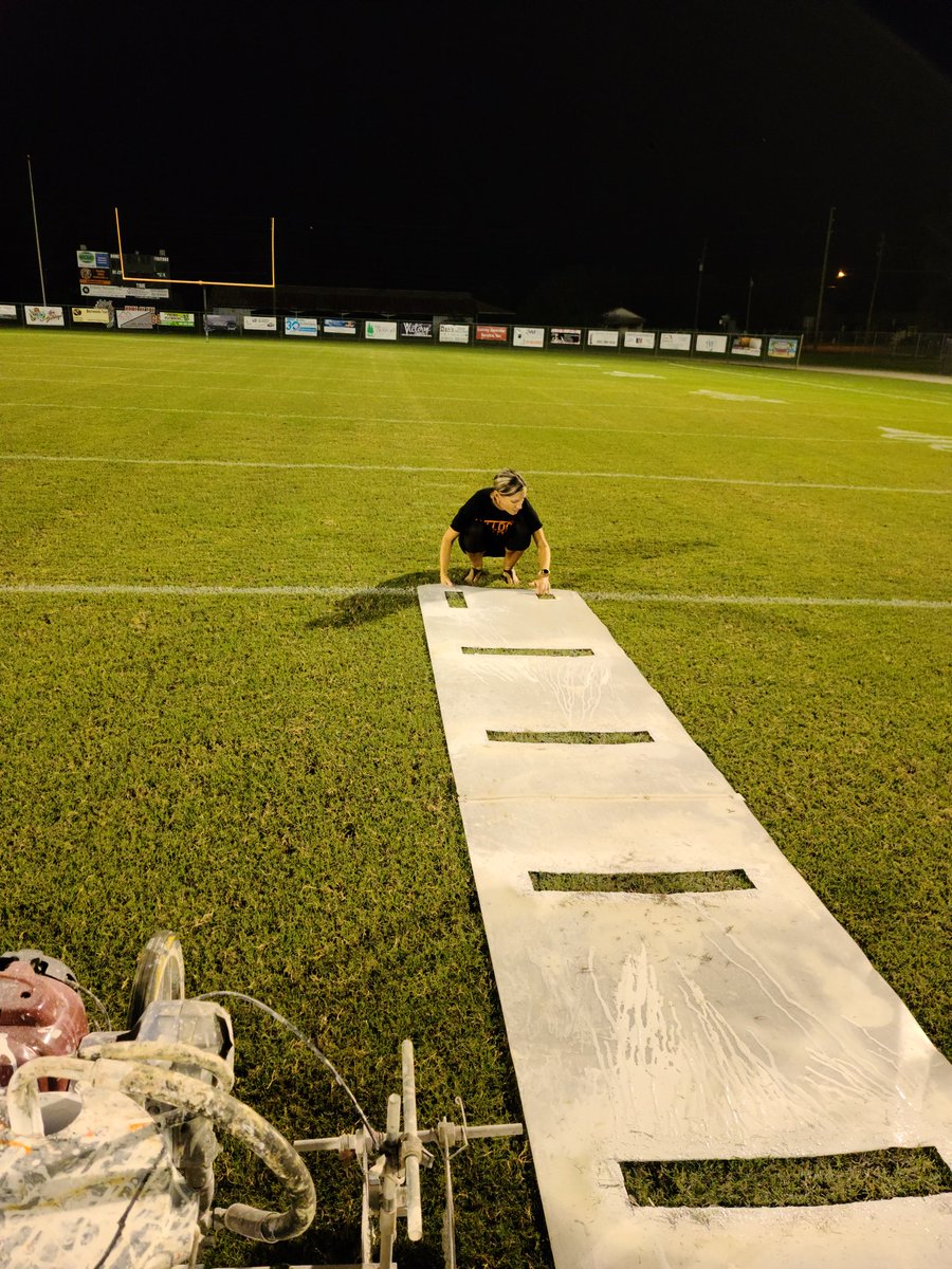 When your wife helps paint the game field... winning! #coacheswife #bestwife #football #fieldpaint