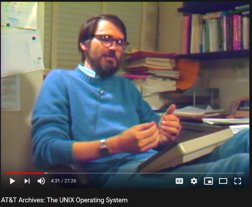 Look at this pose of Brian Kernighan, he was cool before cool became a thing!