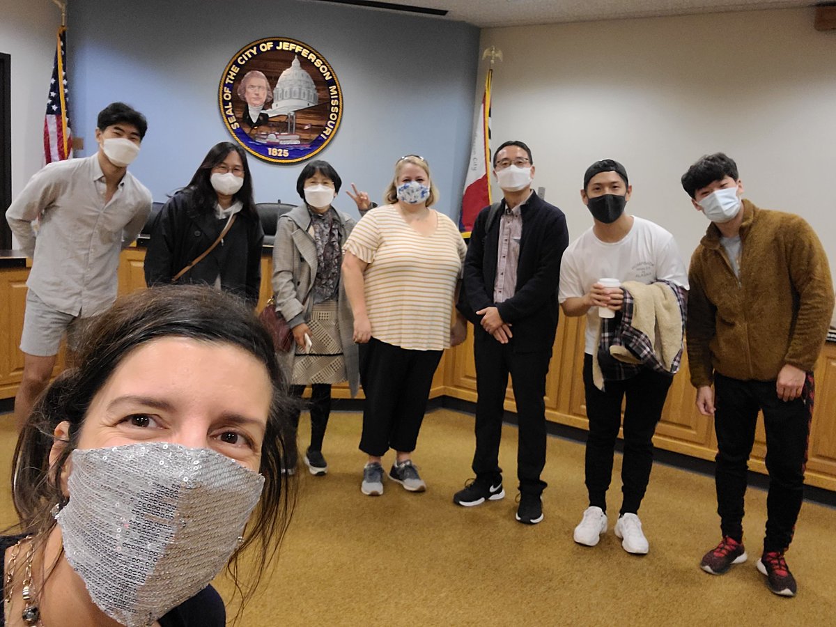 CarrieTergin's tweet photo. Thanks longtime friend Amy Henley for bringing students from Midwest University in Wentzville to #JCMO! They are from Korea, some are enrolled in Midwest's Aviation program. Amy teaches English as part of their curriculum. #VisitJCMO #SelfiewiththeMayor Thanks for the mums! 🏵 https://t.co/PD8GuxJHJ9