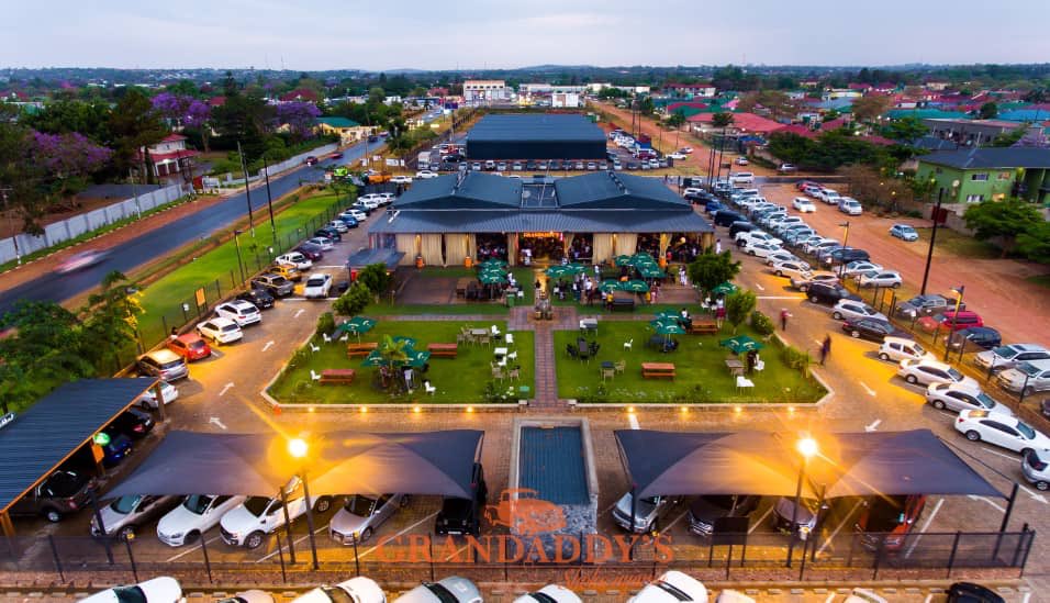 A lively local favorite known for its open-air vibe, juicy grilled meats, big sports screens, and energetic atmosphere.