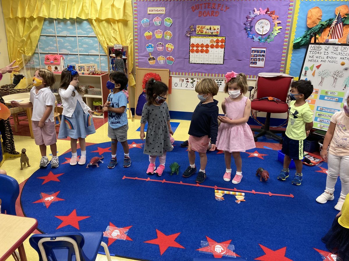 Making ABC patterns just like candy corn (white, orange, yellow) using ourselves and dinosaurs. Check it out...girl, boy, dinosaur. #trinitylearns