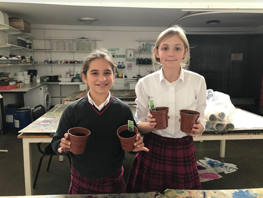 QueenMargarets's tweet photo. Our first Gardening Club took place this week. Here we have two of our green fingered enthusiasts who have planted some chilli seeds to grow indoors over the winter. #QMExperience #Enrichment #GardeningClub https://t.co/gQH9v9AObJ