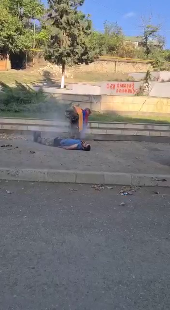 8731's tweet photo. #Azerbaijani coward soldiers murdered two captured #Armenians. This is the people, this is the army, this is the government of #Azerbaijan who expect us to give them #Artsakh's security. Never! #Armenia is the only guarantee  of #life and #safety of people of #Artsakh. https://t.co/ArF8Kydnaa