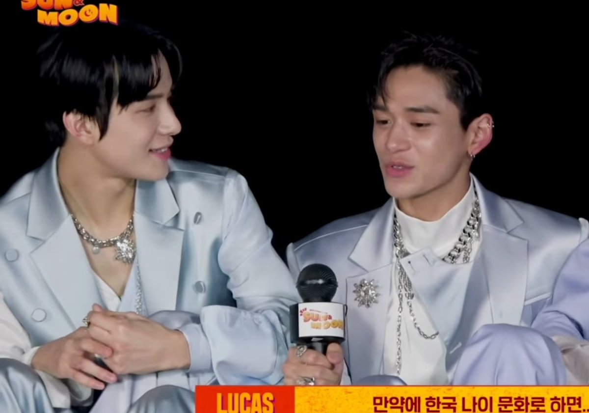 the way jungwoo looks at lucas with heart in his eyes  #luwoo  #LUCAS    #JUNGWOO  
