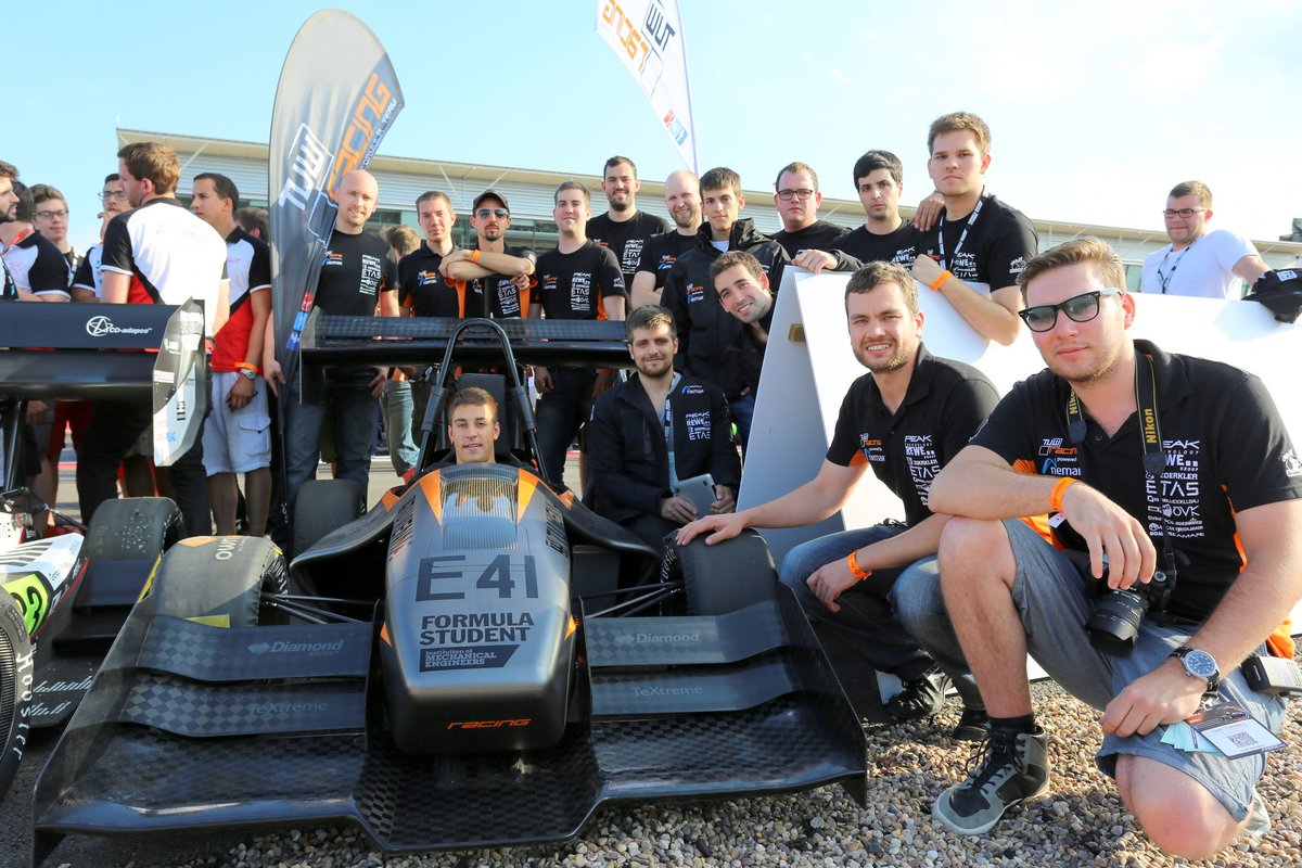 FormulaStudent's tweet photo. How about some smiles and Silverstone with these cars all the way back from #FS2014 to bring some sunshine into your Thursday - anyone recognise themselves or their friends? #throwbackthursday https://t.co/Uq5JCrsRXB