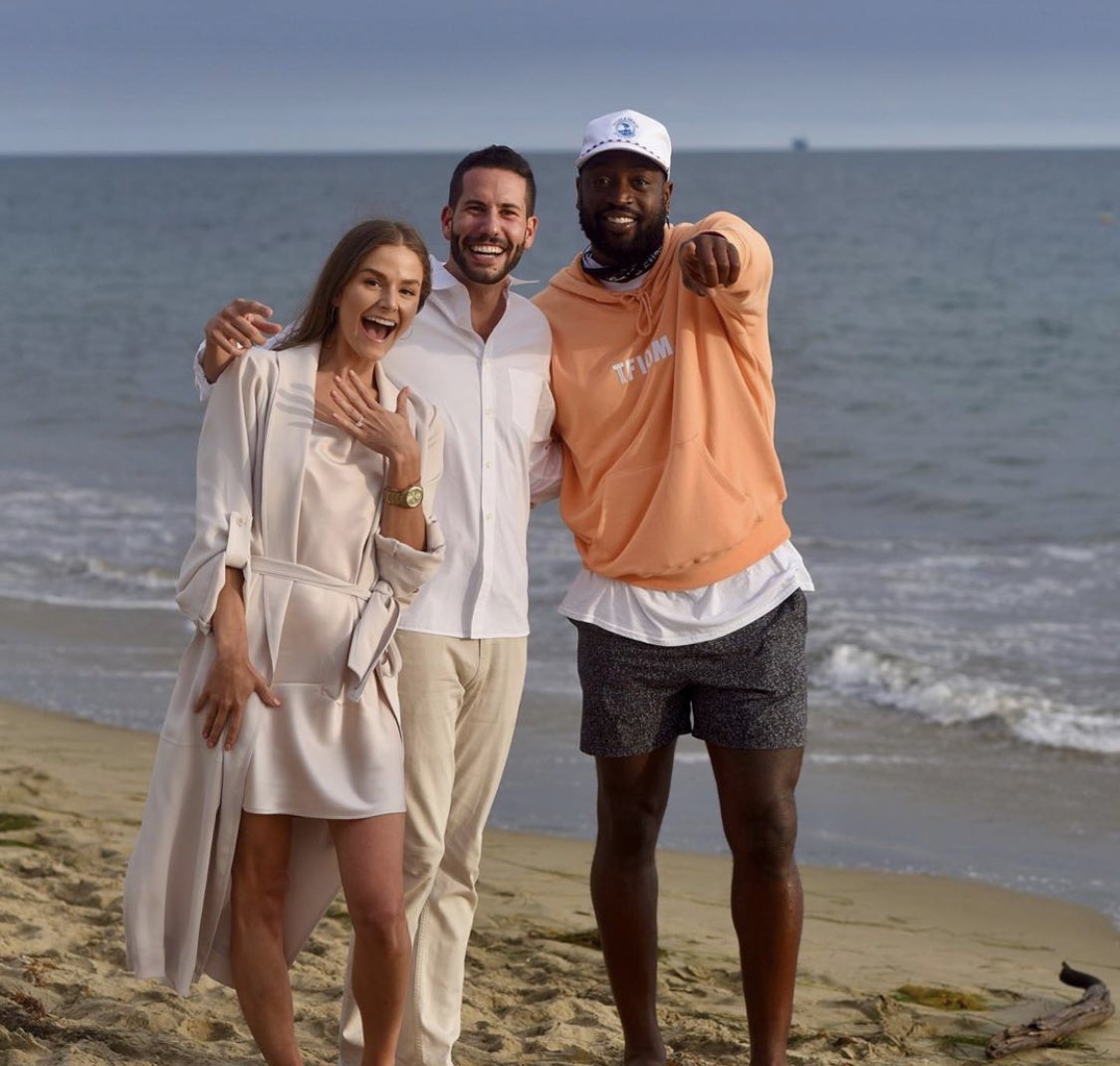 Love this. <a href="/DwyaneWade/">DWade</a> happened to be passing by at the right moment and ended up in this couple’s engagement photos. (📷: IG/ryanbasch)