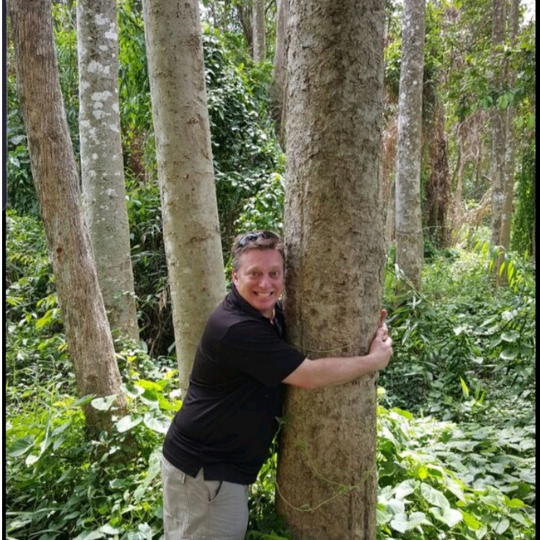 NuwaveBotanical's tweet photo. Who else here is a tree hugger? NuWave Botanicals’ founder Chris was getting goofy in Indonesia.😄 #TBT https://t.co/T0hJ0RRKm3