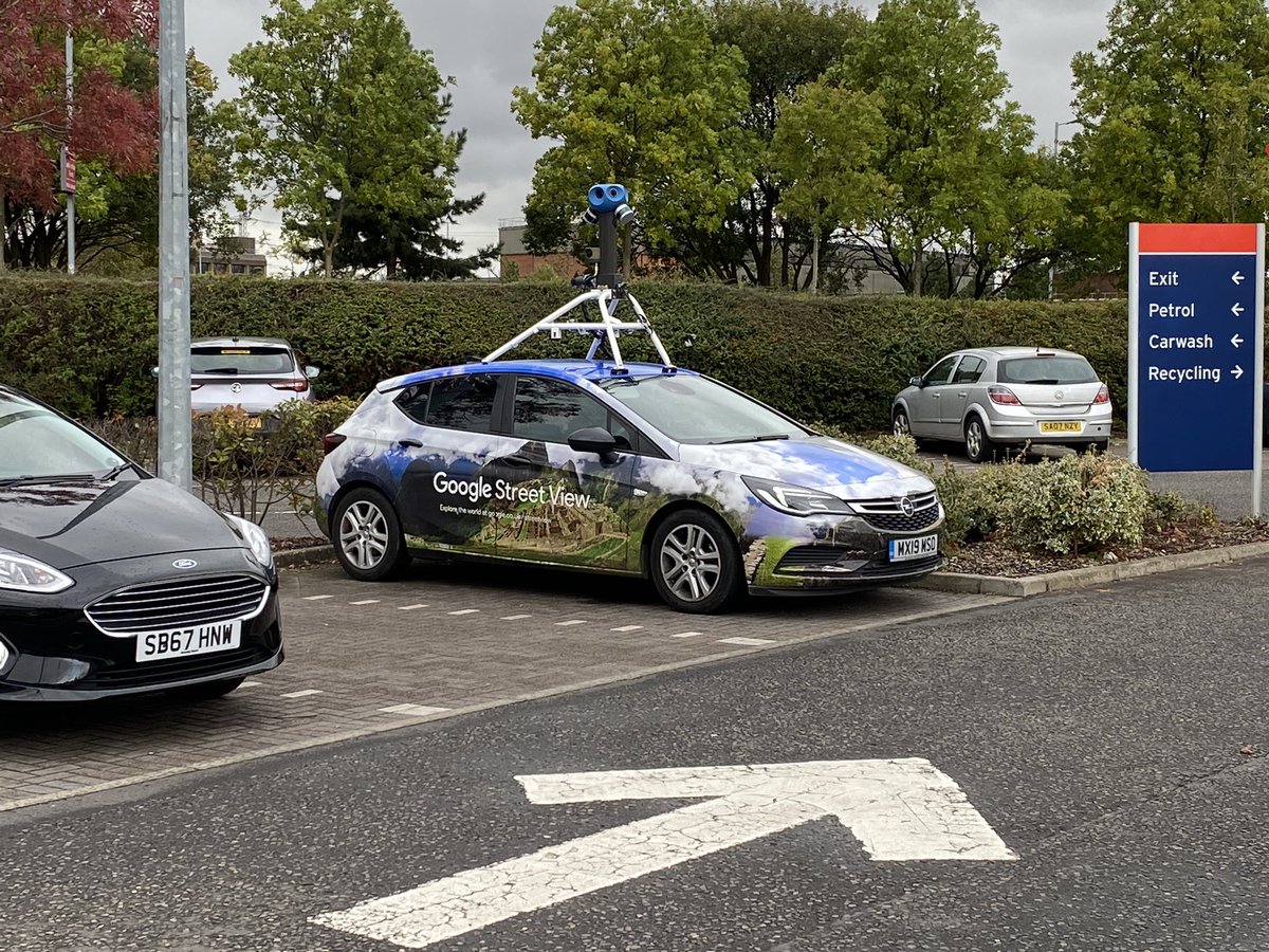 Spotted in Glasgow Yesterday. In unrelated news our marketing plan has been updated:
 
1. Run behind this guy for a few miles in our new branded gear
2. Wait 6 months 
3. Go viral when Street View is updated 

💡🤔😁🚚