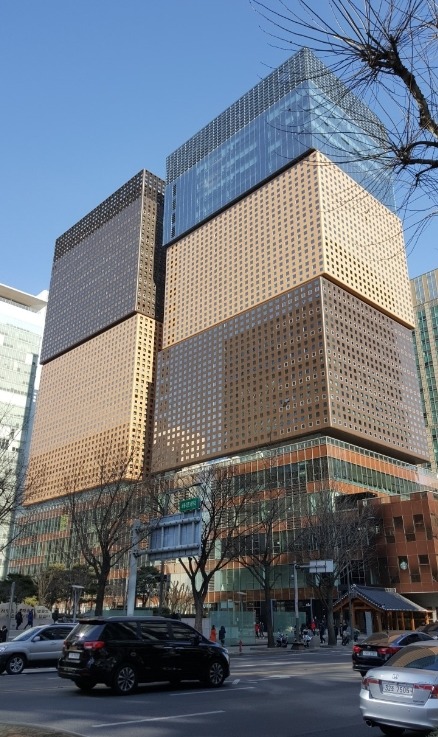 5. D Tower (Gwanghwamun area) [00:53]D Tower is one of commercial buildings near Gwanghwamun area. It stands out among other because of very distinctive windows on outside walls. Commercial area takes up first five floors, being filled with many famous restaurants.