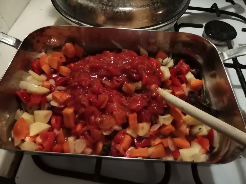 Add the can of tomatoes/ or diced fresh tomatoes if you are using them and let it simmer until the vegetables are just tender.