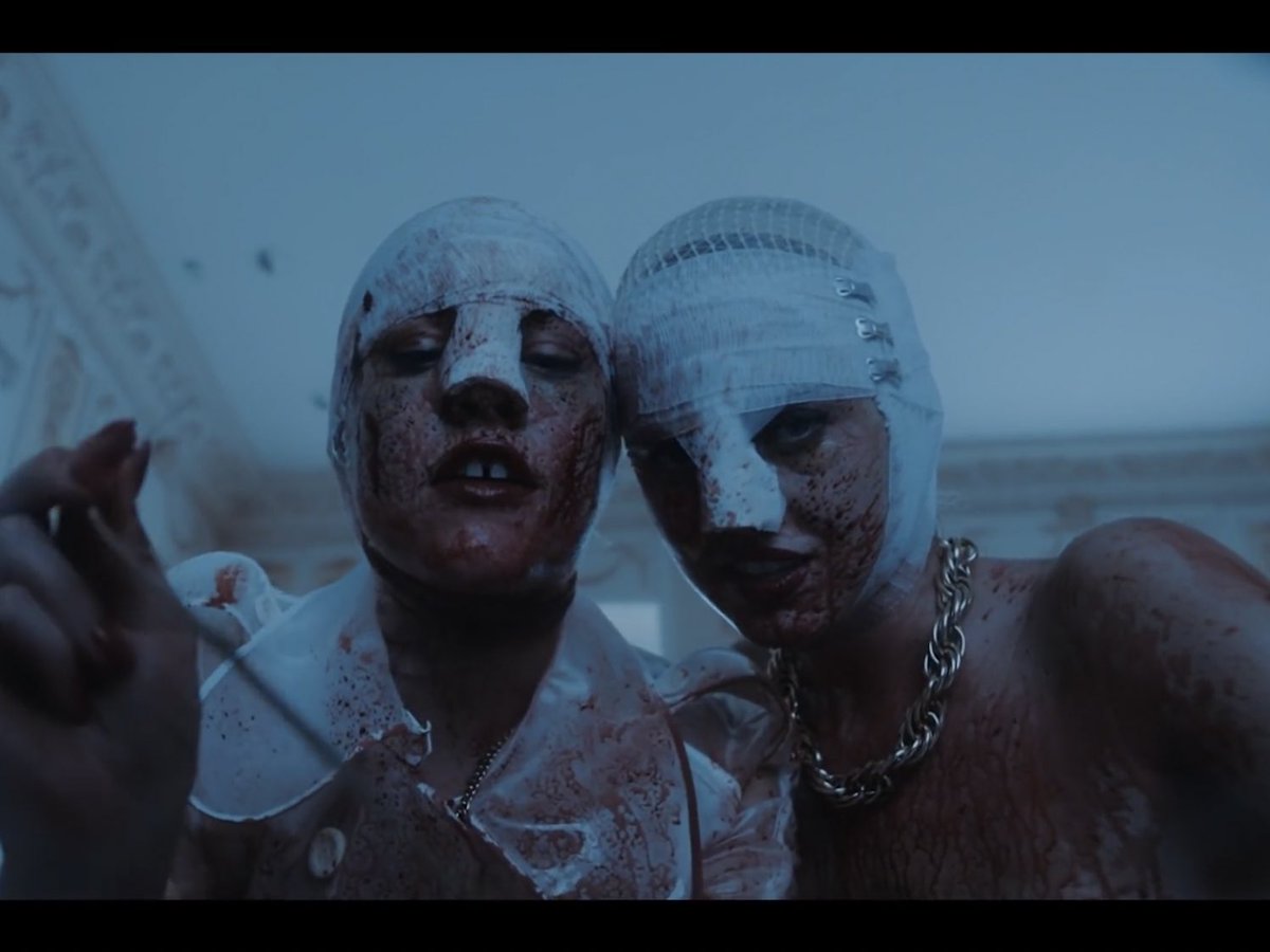 Graphic from music video//The music video continues to show the two women enamored by Abels head, so much that they kill a guy to attach Abel’s head to try to make Abel “whole.” This doesn’t bring him to life though, in the end he’s still dead.