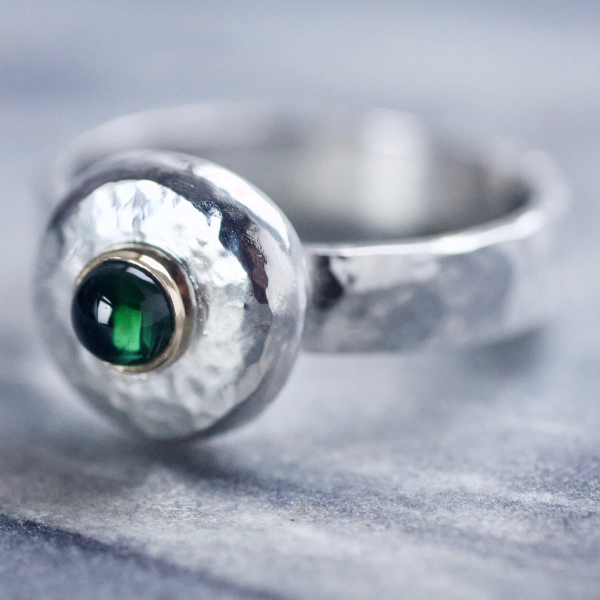 This one of a kind, green tourmaline, chunky silver &amp; gold ring is sitting pretty at the Pop Up, just waiting on a new home! Handmade from scrap sterling silver, melted down &amp; recycled in the workshop with a gorgeously rich dark green tourmaline set in a 9ct gold bezel.