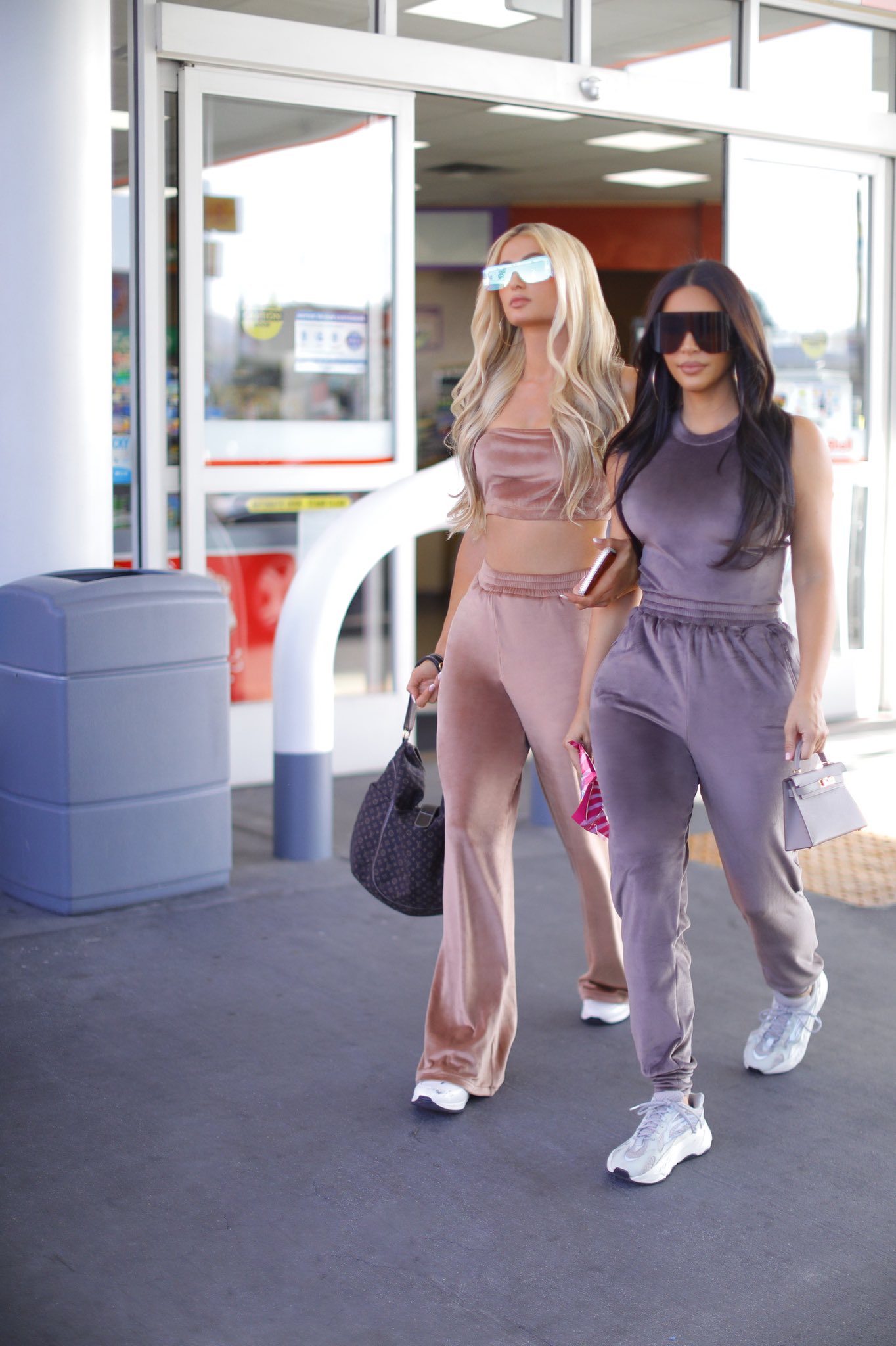 Kim Kardashian and her old boss Paris Hilton serve early 2000s