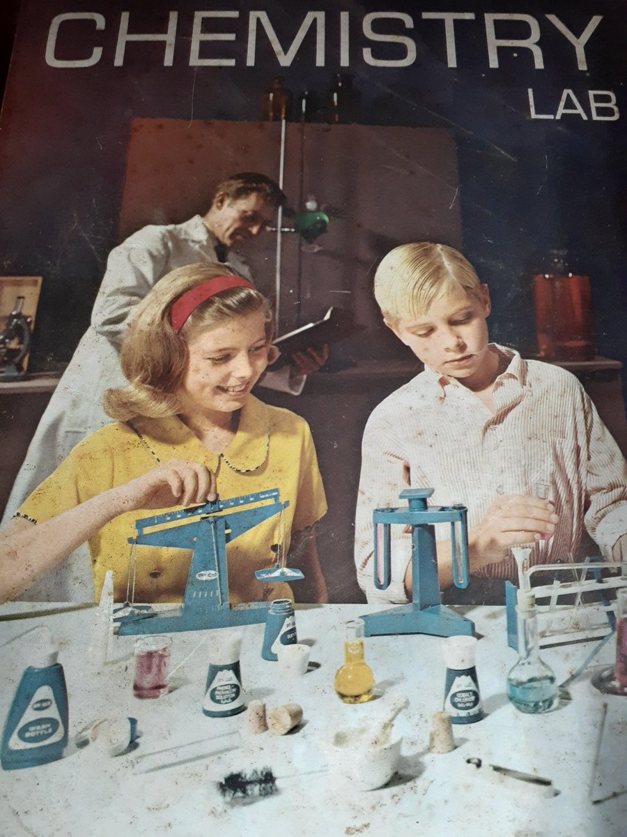 now for the highlights...a chemistry set from late 1960, a cup set from the 1920s, a poster from the late 1800s, and a fisher price clock from the 60s