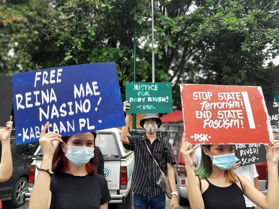 LOOK: Activists call for justice for Nasino and River in a rally outside the Manila North Cemetery. (: Kapatid) | via  @MBMinkaTiangco