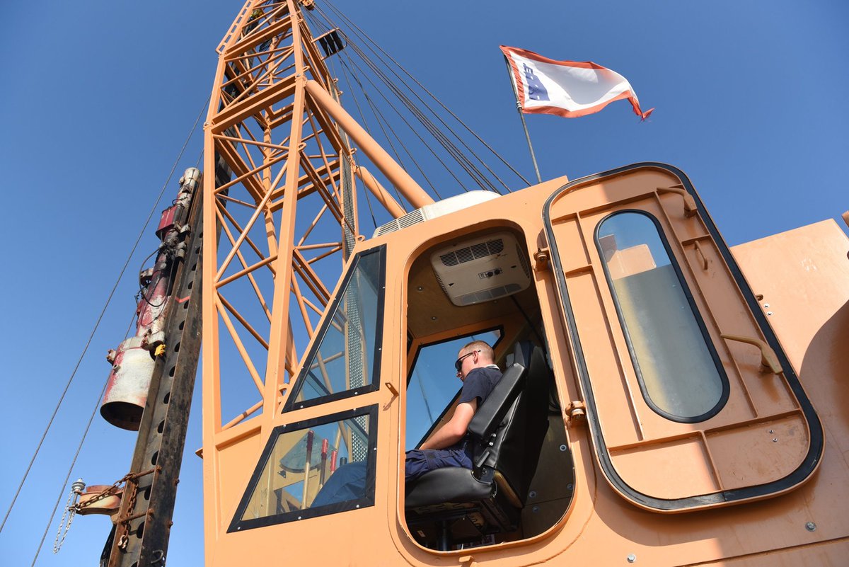 USCG's tweet photo. The crew of #USCG Cutter Clamp has been rebuilding ranges piece by piece to re-establish aids-to-navigation within Sabine Pass, TX, post #HurricaneDelta to ensure our waterways are safe for transit. #PortReconstitution #MaritimeTransportationSystem #FridayFromTheField https://t.co/2umkaatnS6