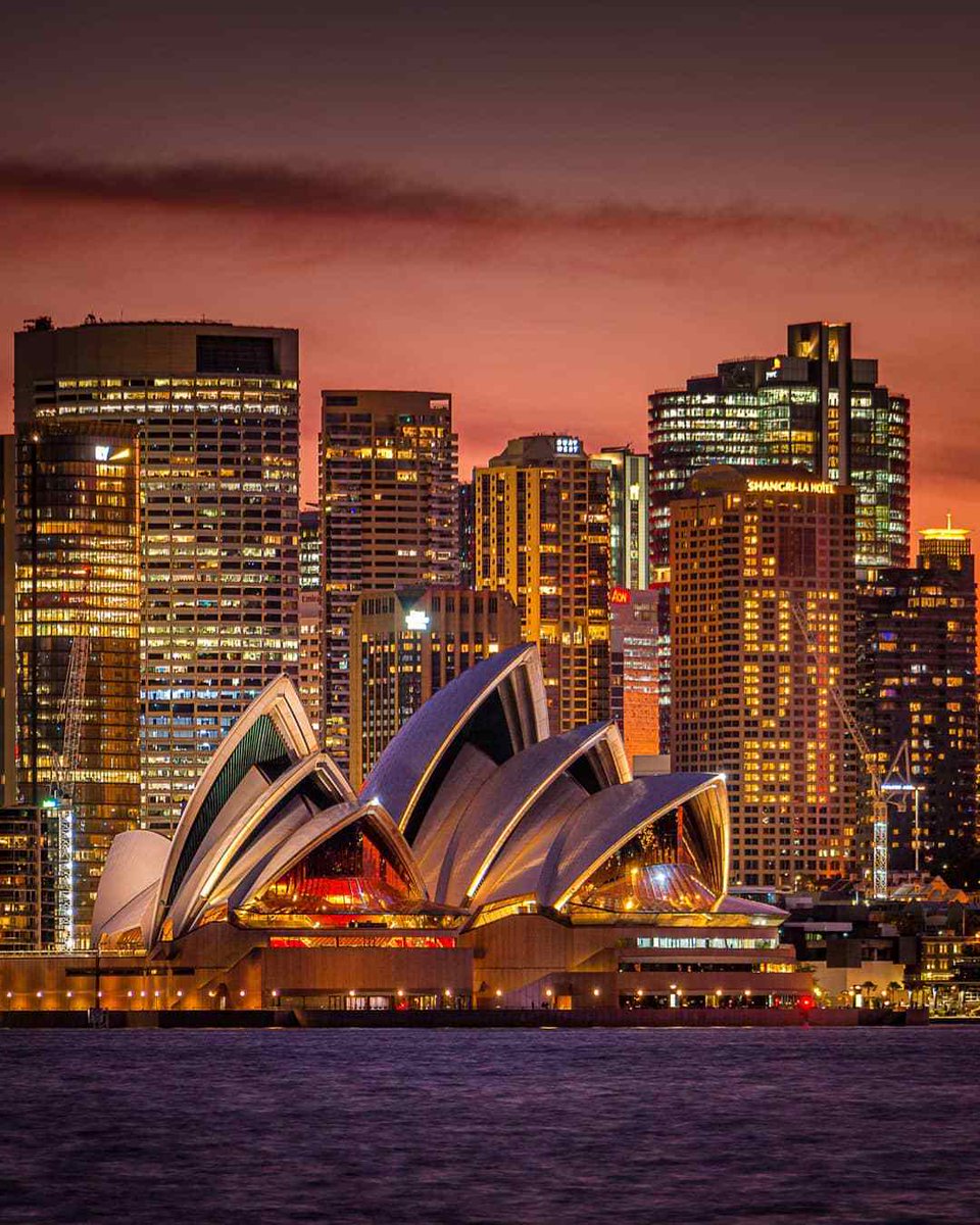 Australia's tweet image. Don’t mind us, we’re just mesmerised but another glorious @sydney_sider sunset 🔥
IG/janbreckwoldt_photography captured this shot of the #iconic @SydOperaHouse  as the sun sets over the @NewSouthWales harbour. 
#seeaustralia #visitnsw #ilovesydney #holidayherethisyear