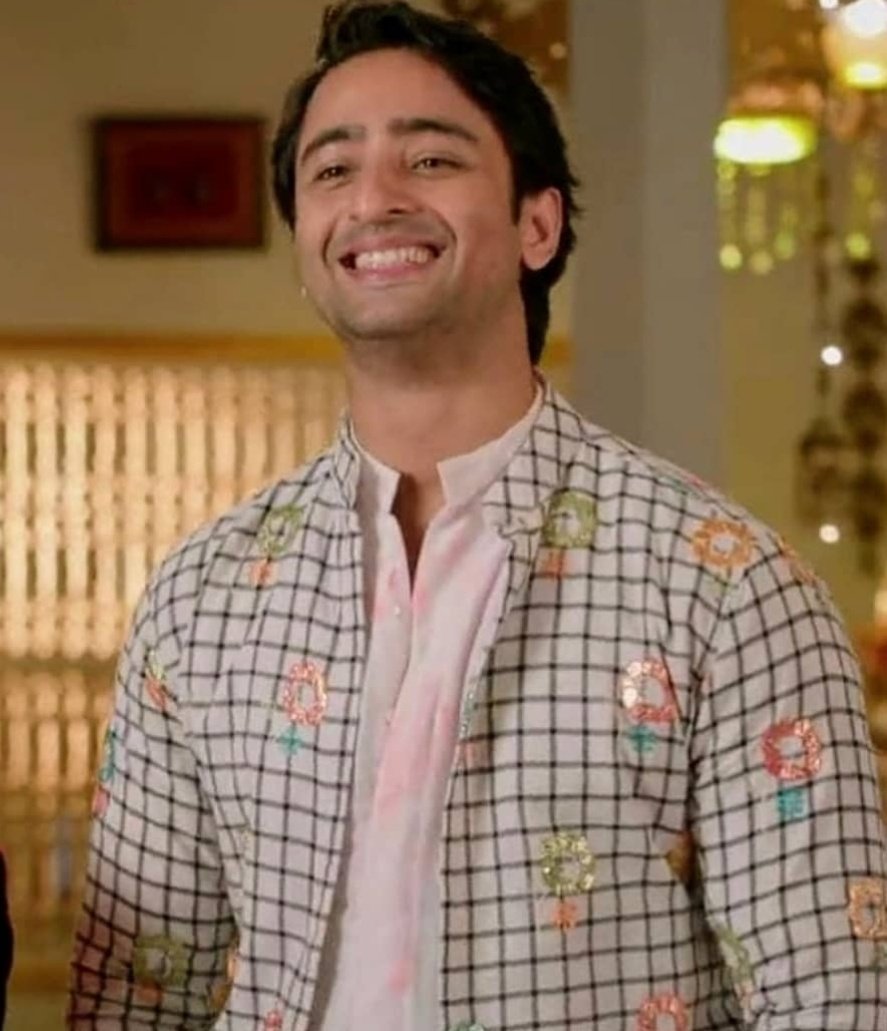 Stylish AbirThe Holi20 lookThis time Abir had sported a white n black chequed kurta wid multicoloured prints giving it a Holi vibeAs we know Abir aka Shaheer looks dapper in whites this time too d dotting hubby made us melt wid just one glimpse of him  #EvergreenShaheerAsAbir