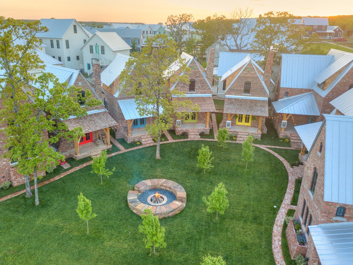 8 cottages, parking, common green with community fire pit = 1/3 of an acre.