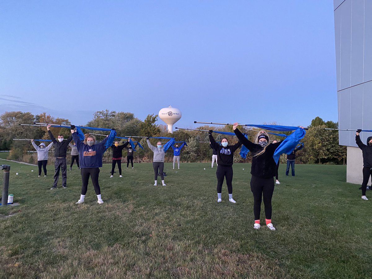 LZHSColorGuard's tweet image. Braving the cold (with a little hot chocolate) to practice spinning! Go Bears!