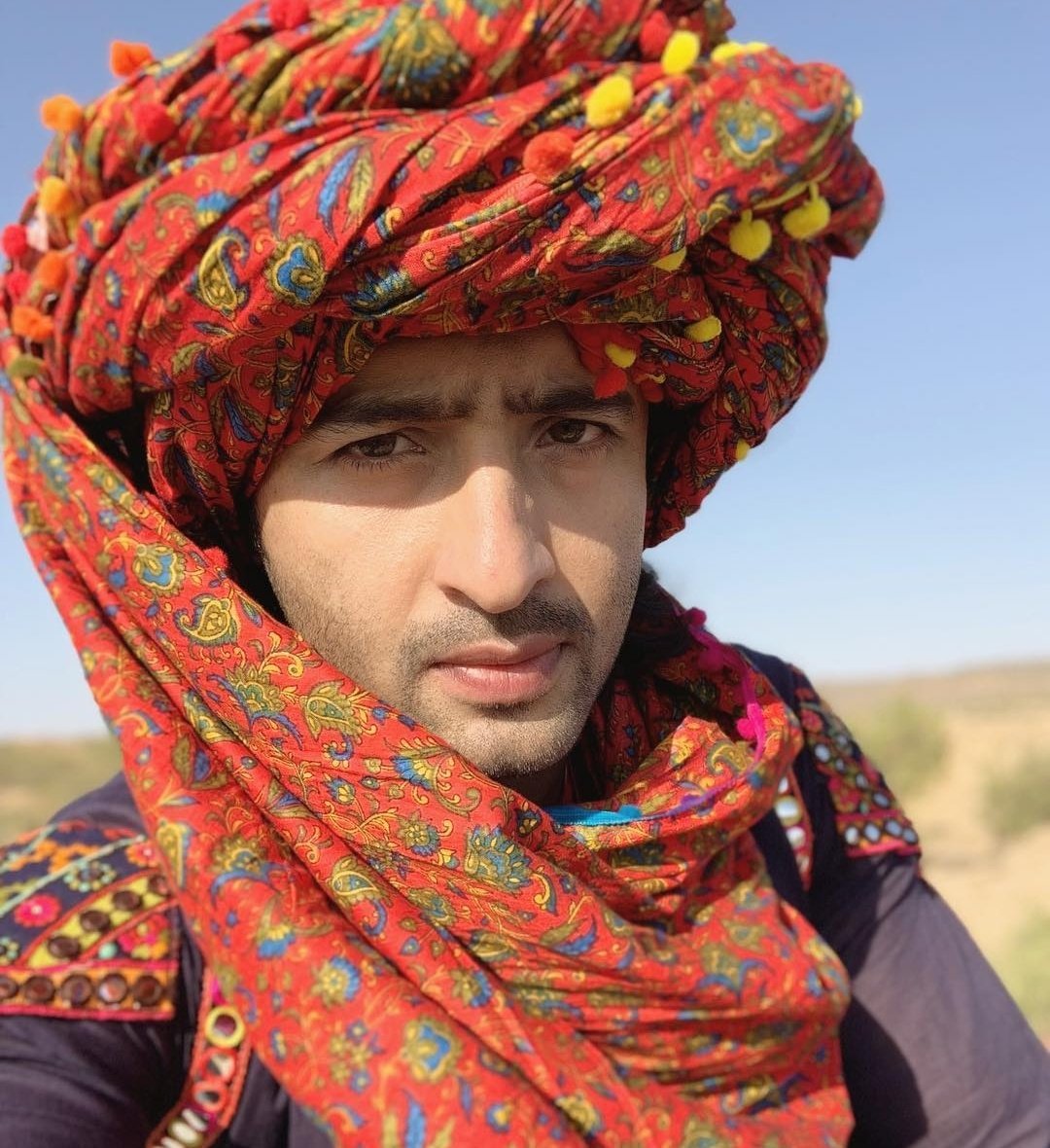 I Stylish AbirThe Gujrati Chokro lookThis was the look of Abir Rajvansh which introduced him to usThe Red multicolour printed turban looks perfect with the handsome face  #EvergreenShaheerAsAbir