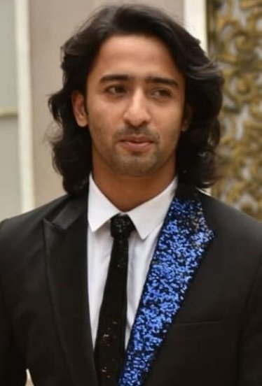 Stylish AbirThe KuKu Sangeet lookAbir Rajvansh looked prince charming straight outta a fairytale with that black suit with blue glittered lapel adding to his handsomeness We could not move our eyes from this dapper boy #EvergreenShaheerAsAbir