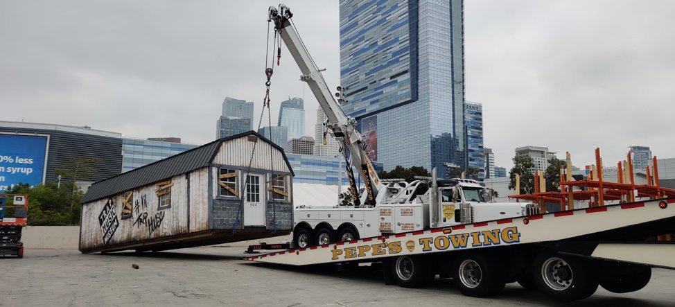 PepeTowing's tweet photo. Anybody missing their trap house? No job is too big or too odd for Big Flipper. #bigflipper #pepestowing #towinglife https://t.co/uA62YGju4F