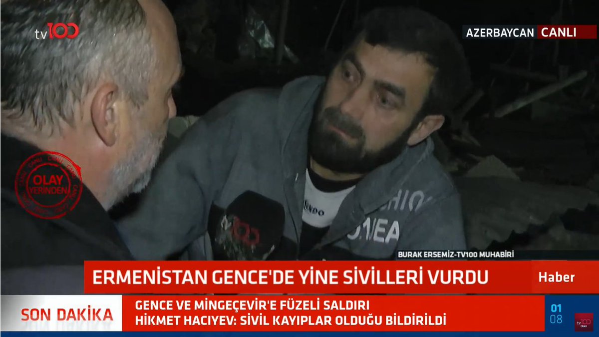 The journalist tried to interview a person, he said "You can't tell it with words brother, only with" (shows his heart). Probably a family member someone lives here.