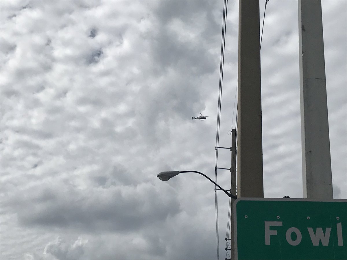 kaitlinroseg's tweet photo. A helicopter is up over Fort Myers and police have started to block off Dr. Martin Luther King Jr. Blvd again in preparation for Trump’s motorcade to leave Fort Myers. #trumpswfl https://t.co/5ed4fuqRih