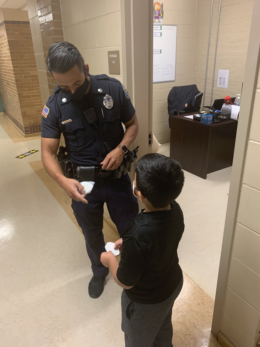 WhittemoreBuzz's tweet photo. Our 2nd Grade Bee Card Winner being deputized by Officer Louie today.  Way to bee #Responsible, #Respectful, and #Ready! https://t.co/RwLMpeunwS