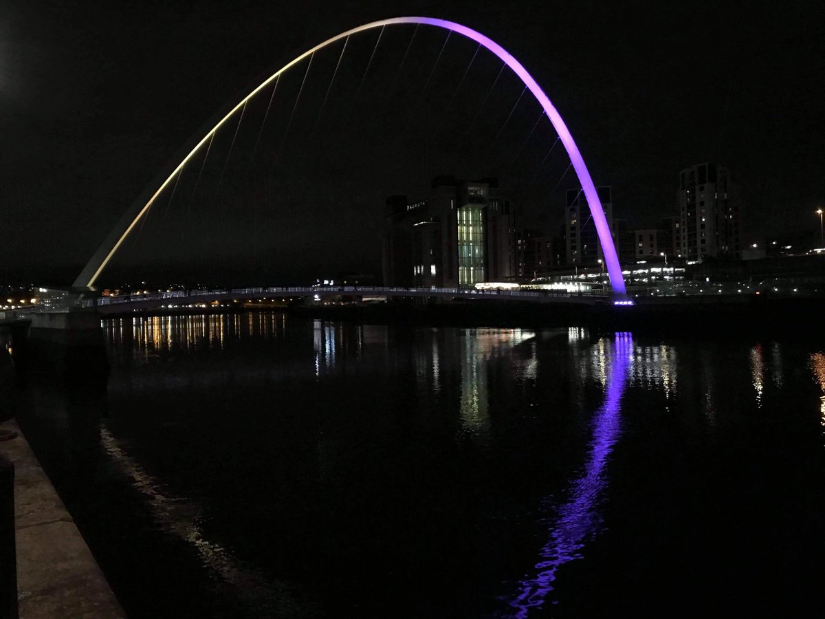 Gateshead millennium Bridge in Newcastle upon Tyne lit purple and yellow #DLDSeeMe @RADLDcam