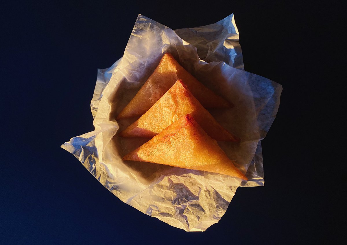 Tetela of Dungeness crab and house-made ricotta, meant to be dipped in a warmed crab custard.