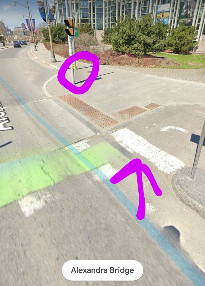 Next: BEG BUTTONS. They were ten feet away from the bike lane! How do I push them? This is not exactly dangerous, just dumb and car-centric and ableist. Get rid of beg buttons! Let people cross the street!