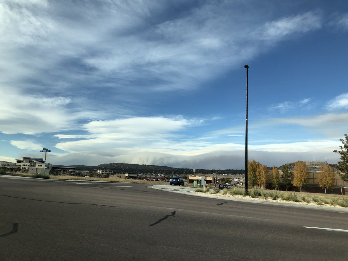 An ominous view as smoke from the #EastTroublesomeFire, more than 80 miles away, rolls into Castle Rock, CO. #cowx #fire
