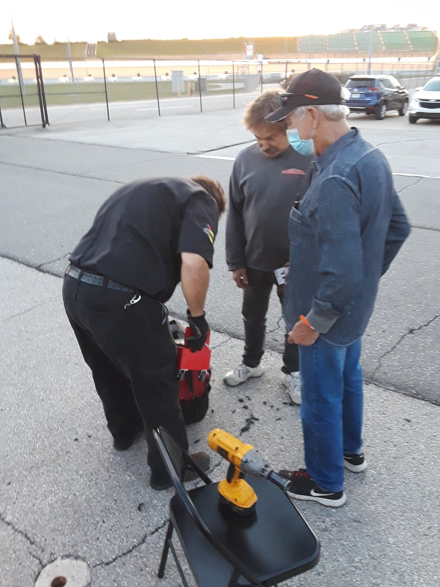 DriverBradSmith's tweet photo. @COLBYEVANSBRAND "Uncle Ed" Basham (Darrell's older beother), Roy Knight & crew chief Carl Brown help Brad finish up the last minute details before loading at the @kansasspeedway
@ARCA_Racing #RememberHarveyAndTweet
#StrangeStrong
#HenshawAutomation
@GeneralTire
@HiePublishing https://t.co/D4ObCGGdBl