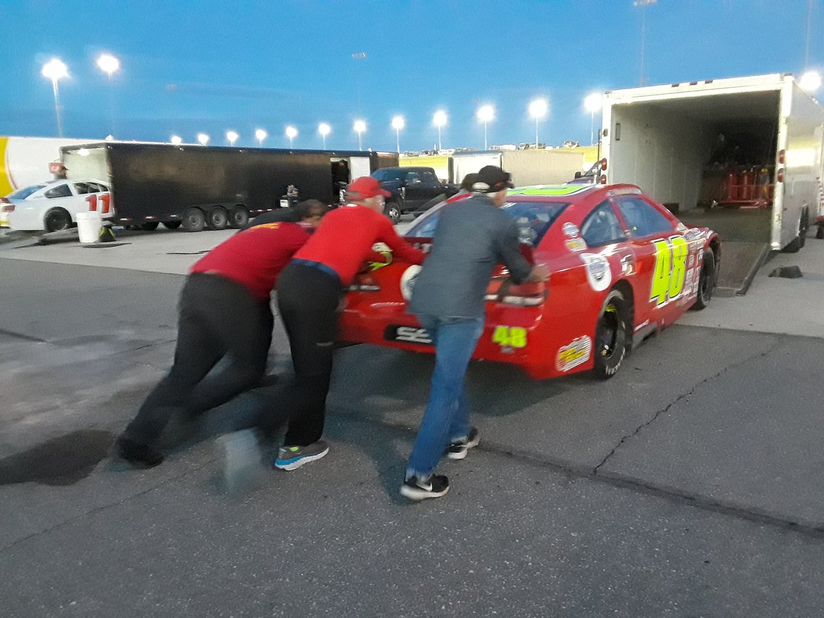 DriverBradSmith's tweet photo. @COLBYEVANSBRAND "Uncle Ed" Basham (Darrell's older beother), Roy Knight & crew chief Carl Brown help Brad finish up the last minute details before loading at the @kansasspeedway
@ARCA_Racing #RememberHarveyAndTweet
#StrangeStrong
#HenshawAutomation
@GeneralTire
@HiePublishing https://t.co/D4ObCGGdBl
