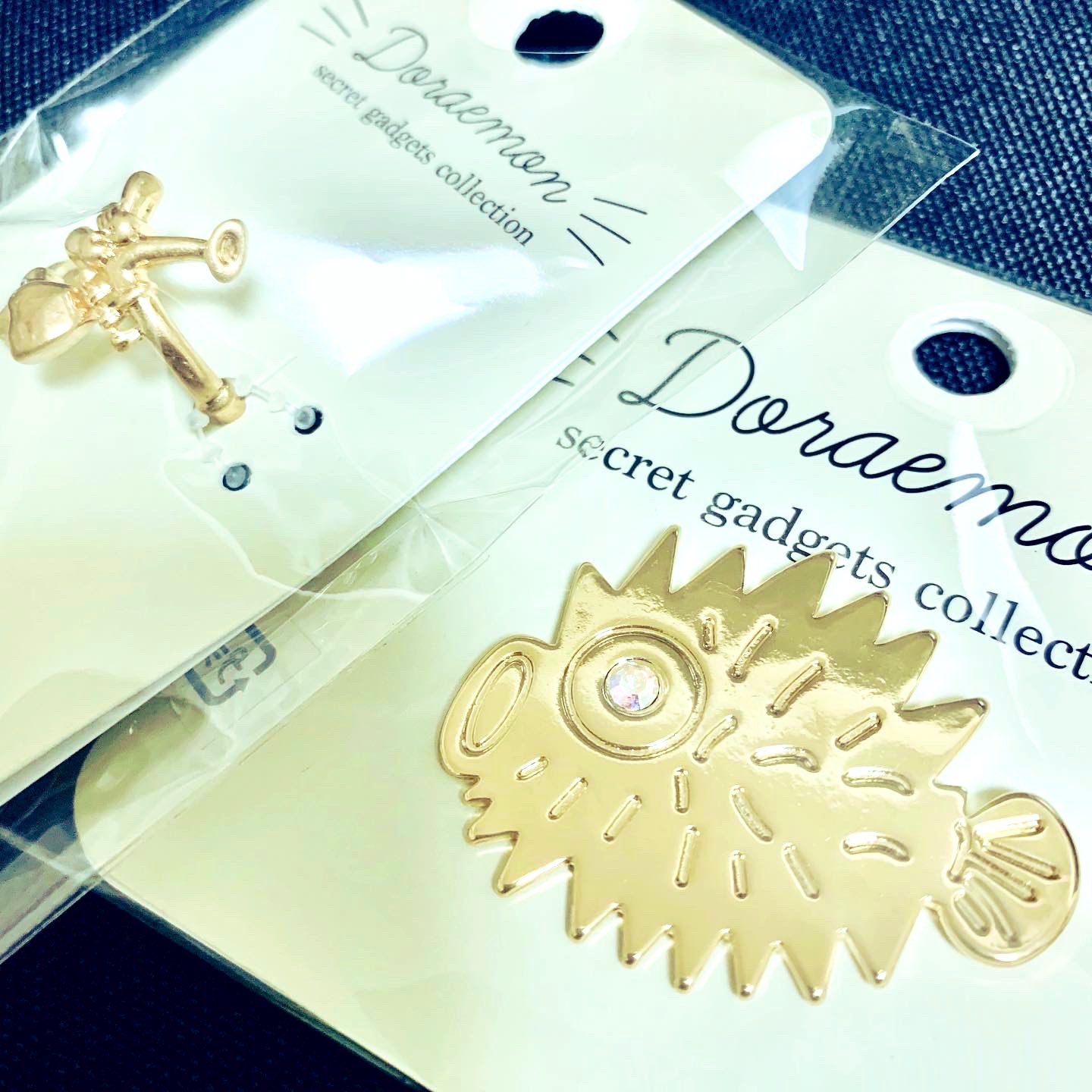れな 昨日未来デパートで頼んだアクセサリーがもう届いた え 可愛すぎる ドラえもん ひみつ道具シリーズ カムカムキャットフード ネックレス わすれろ草 ピアス ハリ千本バッジ ウマタケ リング ねがい星 リング ピアス ネックレス T Co