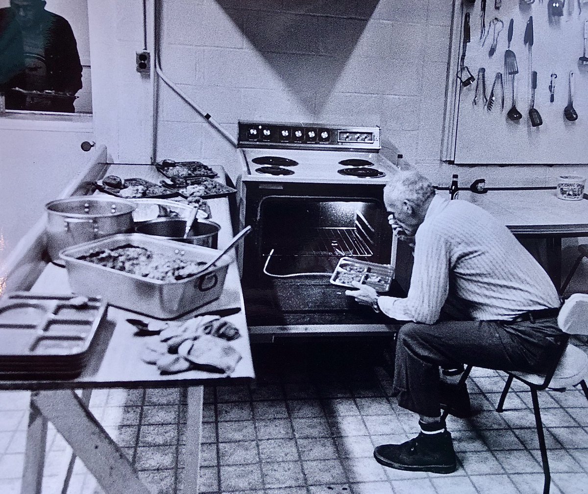 1979 or 1980, A cook at a rescue shelter eats after serving the evening meal to the homeless.