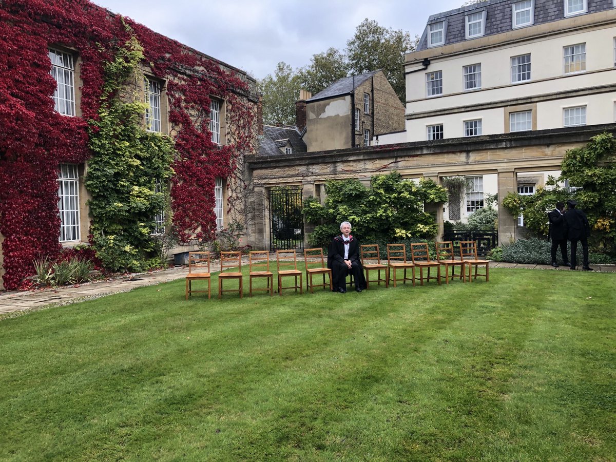 quadview's tweet image. Dean of Degrees waits for matriculands (is that a word?).