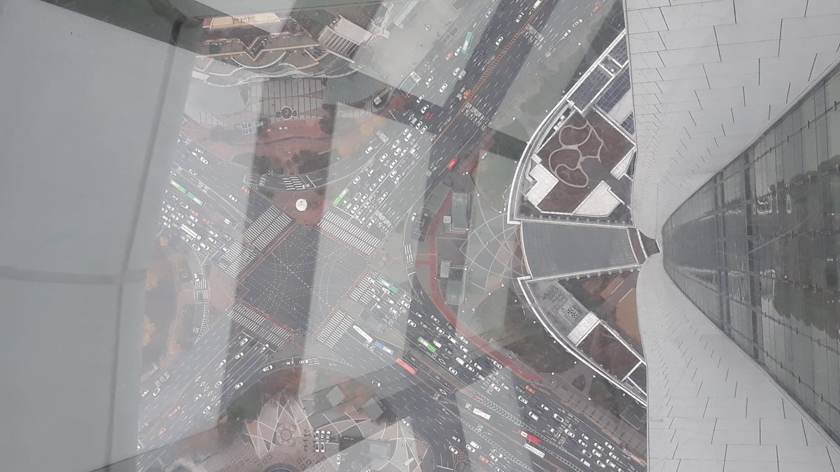 23. Views from the top! You can see the Olympic Park in the distance in first two pics (sorry for the lighting!) ... third pic is intersection of Songpa-daero and Olympic-ro ... fourth pic is after exiting the attraction at ground floor (in Lotte World Mall already)