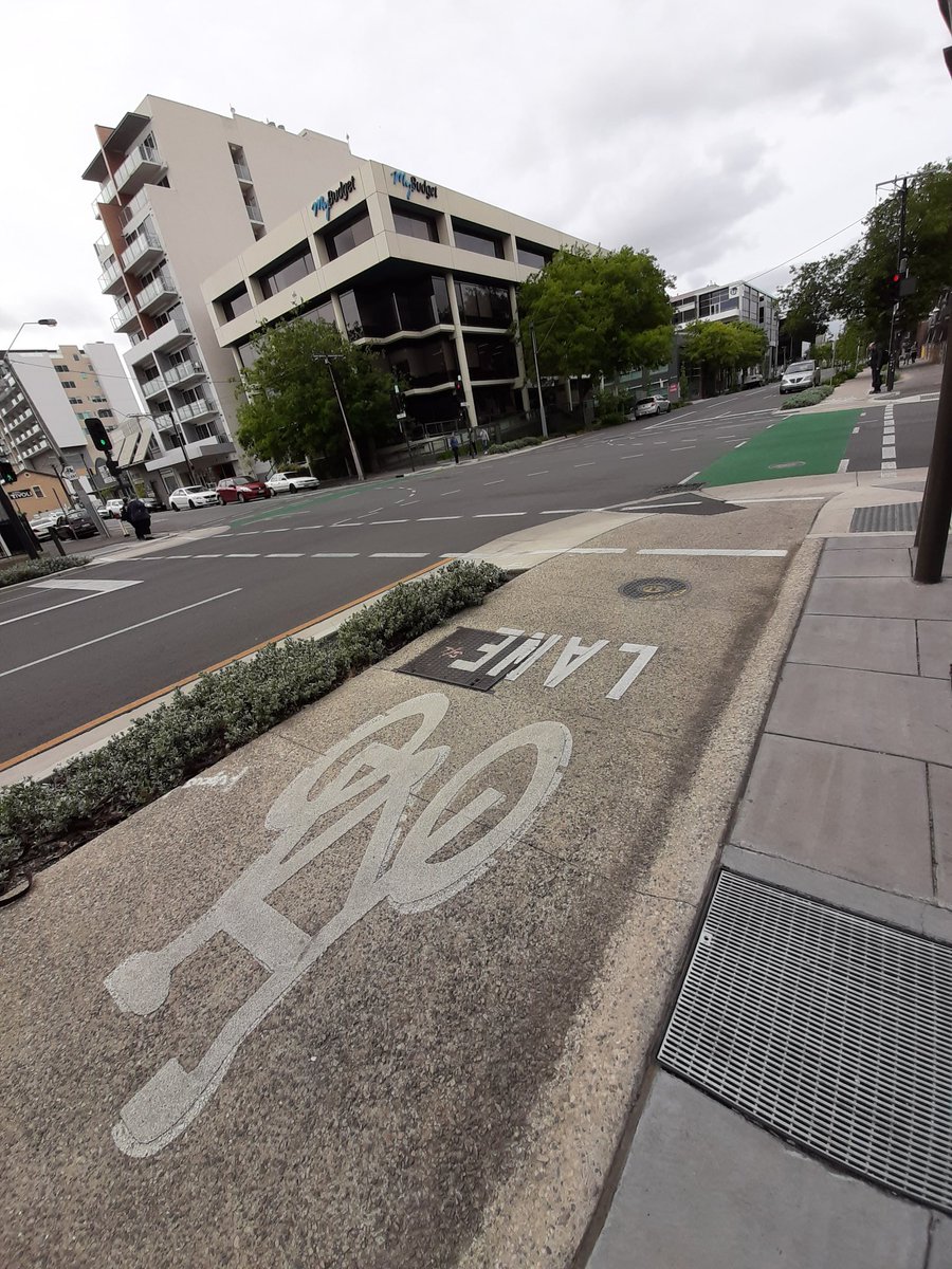 Adelaide's bike lanes are so nice & well laid out I wanna cry. No cycling in gutters, no competition with pedestrians, laidout alongside dedicated bus lanes. Good transitions.