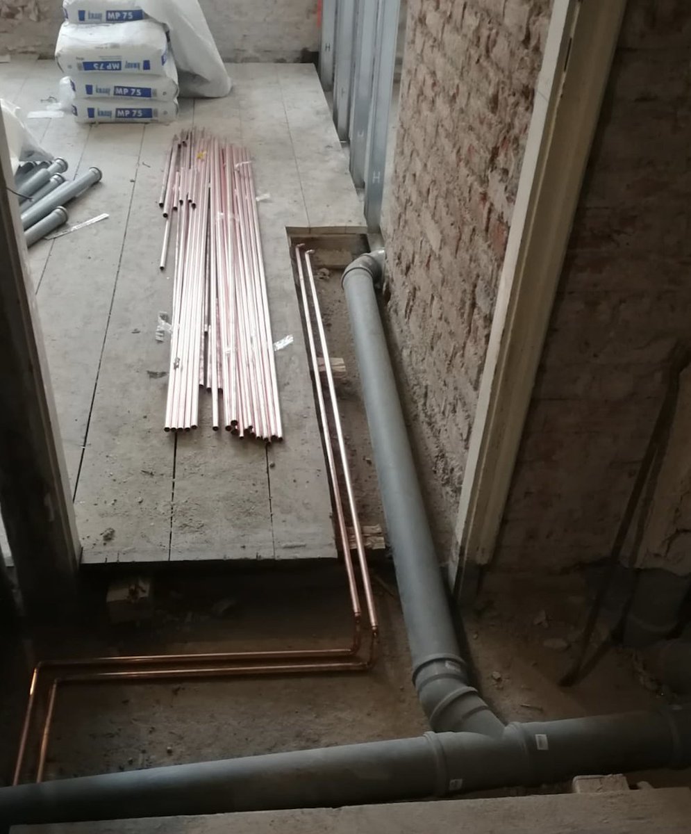 13/ Heating pipes going in for radiators. Sewerage pipes already in for bathrooms and WC.