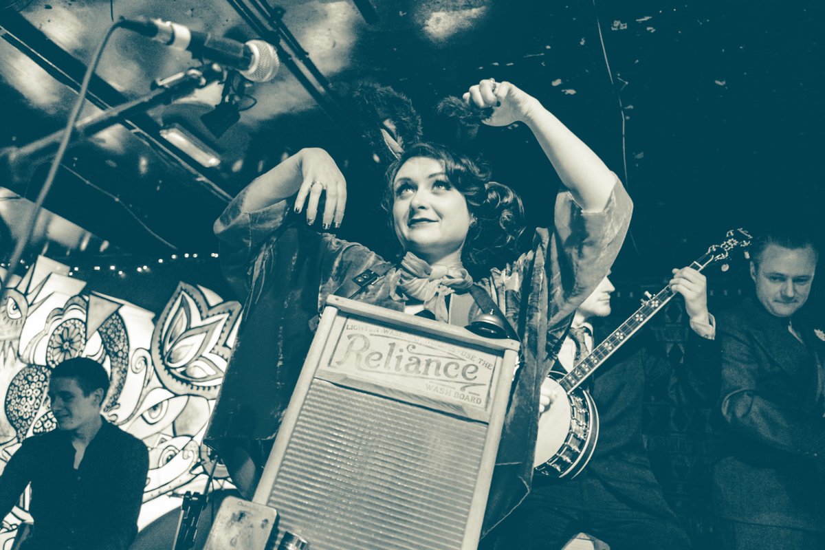 Not even the best washboard player in the band, <a href="/bobbicharleston/">Bobbi Charleston</a> does however have the fanciest outfits so she gets to stand at the front and mouth off.