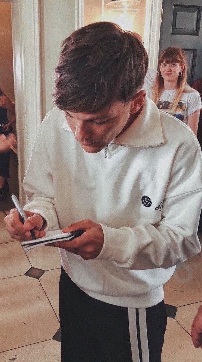 Louis Tomlinson in his best hairstyle aka peaky blinder; a thread