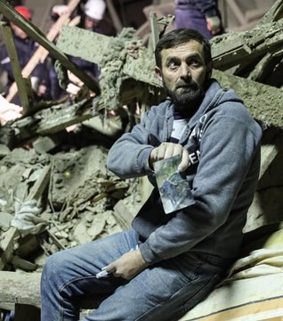 Image of despair. He found a picture of his son, not his son. 
#Ganjacity
#bevoiceofganjacity
#PrayForGanja
#ArmeniaKillsCivilians
#StopArmenianAggression
#KarabakhisAzerbaijan
#StopArmenianTerrorism