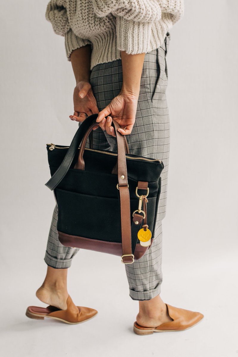 Some designs will forever be classic. 🌟 A little black dress, crisp white tee and the Signature Otto all make the cut. Switch between the adjustable crossbody strap or functional handles! bit.ly/34i9Jcd