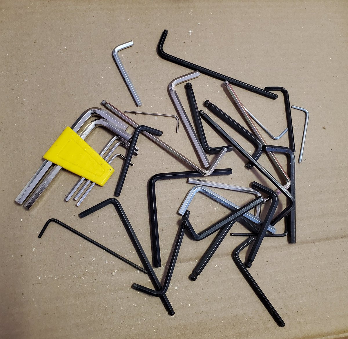 _dave_conklin's tweet photo. Garage cleaning day. Collected all the allen wrenches into one pile (you can't throw those free ones they give you away!)...which begs the question: how many allen wrenches does one family need?!? #toolguy #hoarders https://t.co/M9faMjG5uu