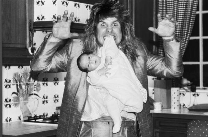 BoredWeb3's tweet photo. Ozzy Osbourne pictured at home two weeks after the birth of his baby boy Jack, 1985. 📷 Mike Maloney. https://t.co/Q0PznFJAme