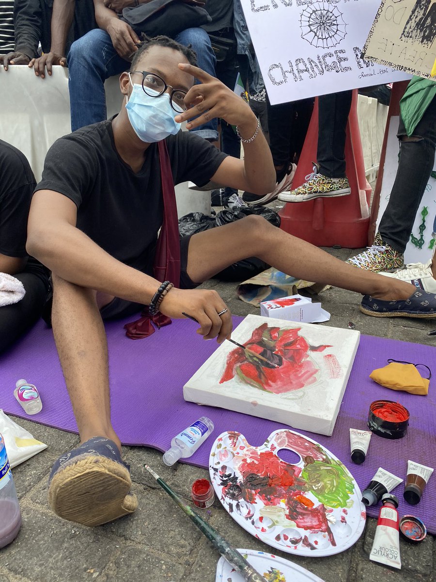 _pelumilawal's tweet photo. And these guys were painting great stuff at the protest ground, passing the message across with their art. Loved it all #EndSARS #ReformNigeriaPolice https://t.co/xUtiQ0pFqq